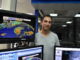 Eddie Sheerr generates his own forecasts when he forecasts the weather. He is at his desk keeping track of Hurricane Leslie in NTV headquarters.