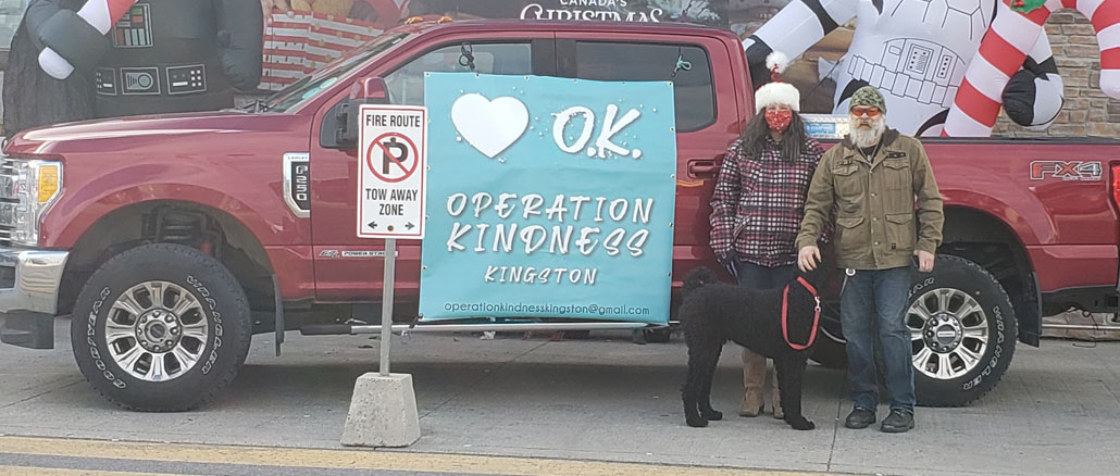 Photo of 2 volunteers for Operation Kindness outside a local Canadian Tired