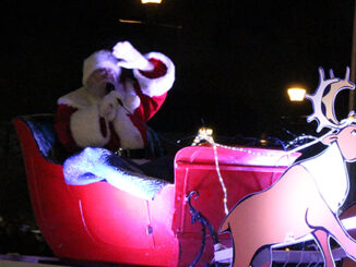 Santa Claus and his float was the main attraction for the parade. His float was the final one.