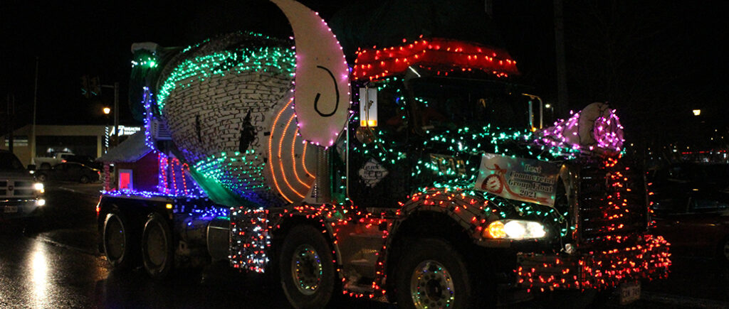 Atlantic Ready Mix suited up a cement truck with elf ears and holiday-themed lights. They won the Best Commercial Group Float Award. 