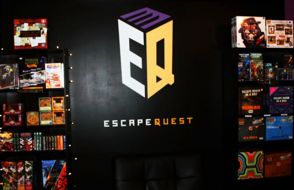 The lobby at Escape Quest features a display of games on the wall