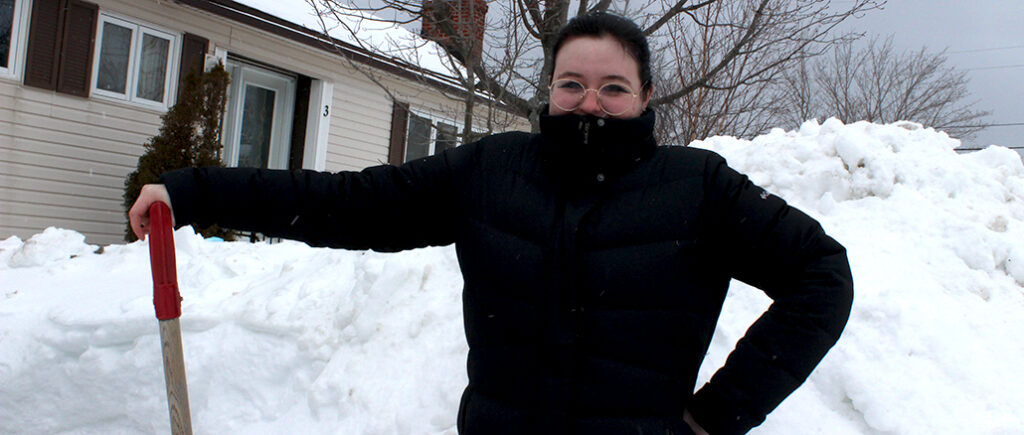 Kendall Hutchings preparing to shovel her driveway after a heavy snowfall on Jan. 30. She hopes to have this clearing issue resolved before another storm hits.