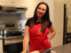 Yuliya Bondavera cooks at her new host family home in CBS, Newfoundland