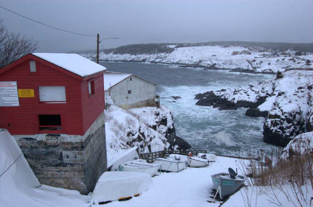 A winter view looking down a steep boat launch in Pouch Cove, Newfoundland. Three teenagers lost their lives hopping ice pans near hear in 2001.1