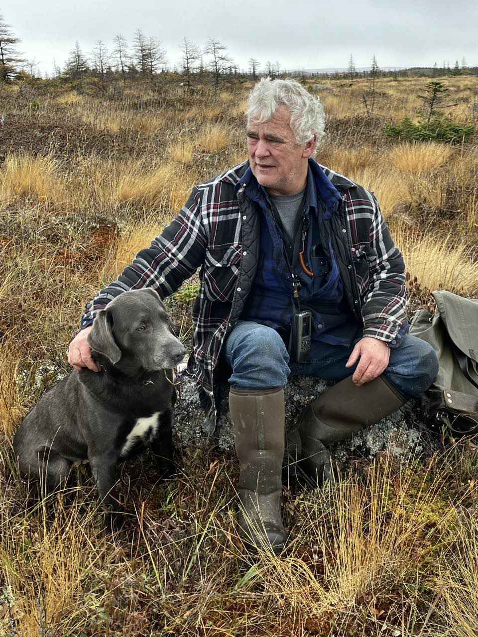 Lloyd Pike and his dog, Hank of Bonavista Bay. Lloyd used camera security to catch thieves on his property.