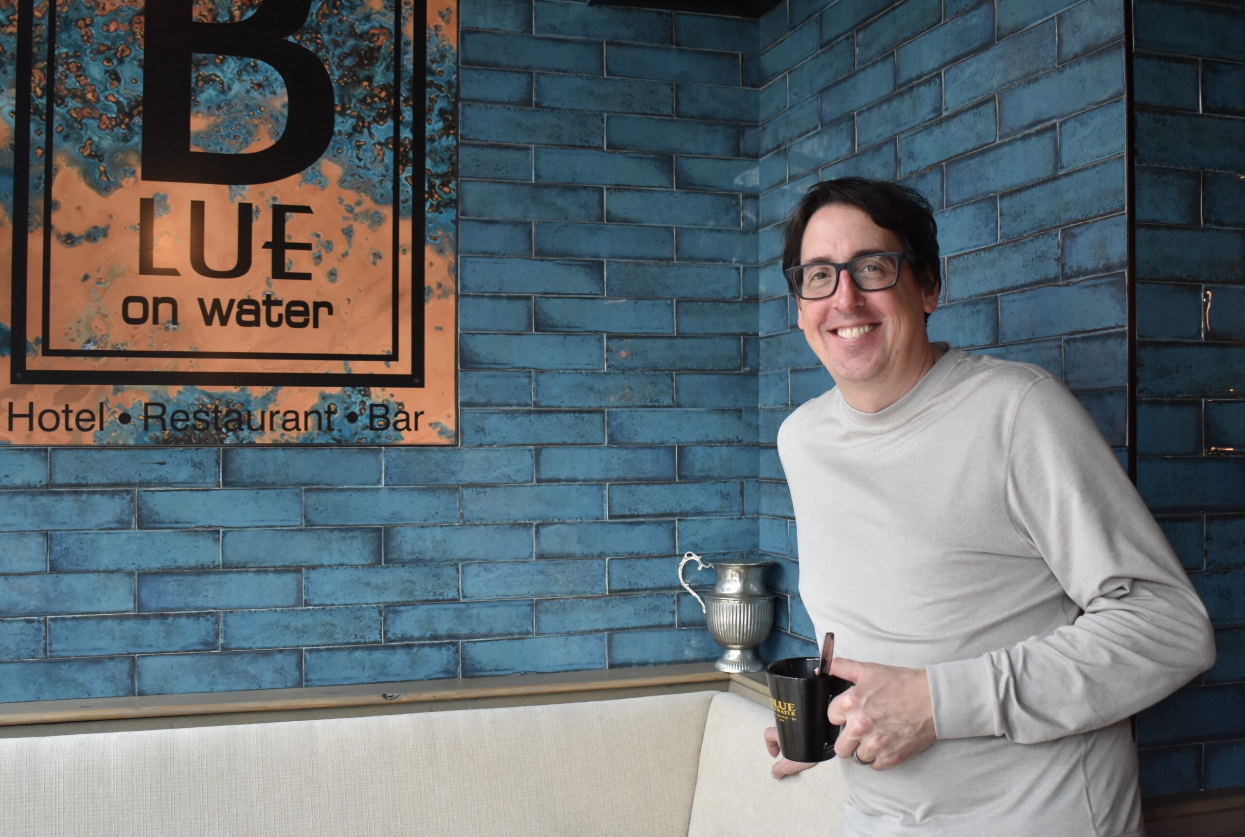 Sullivan Power, operations manager poses for a photo in Blue on Water. A well-known restaurant and hotel on Water Street expected it to be busier during the Canada Games.