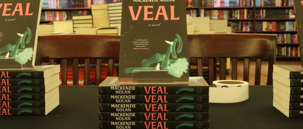 stacks of the book VEAL are laid out at chapters.