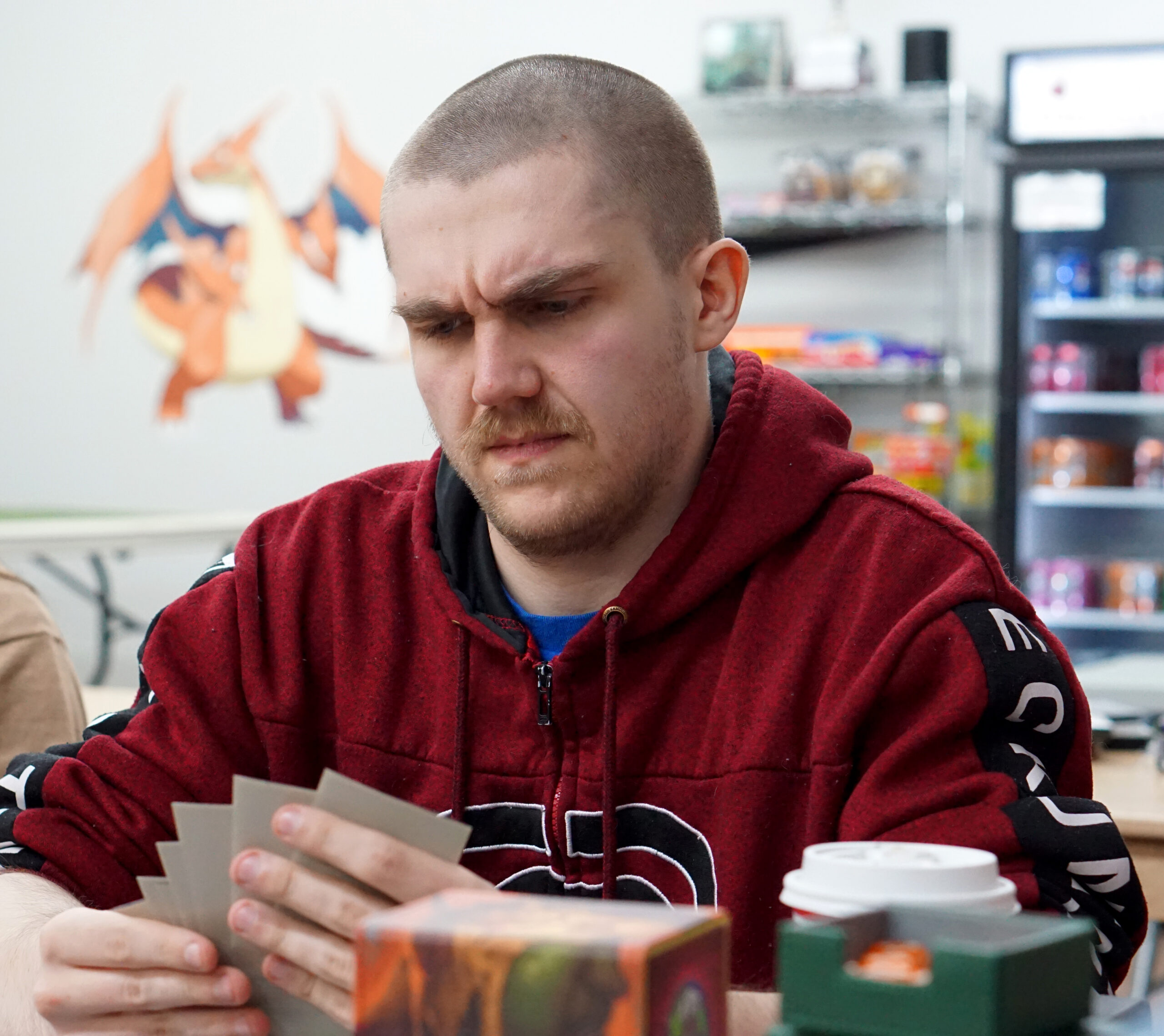 Arrick Chaulk concentrates on a game of Magic: the Gathering. He recently qualified to play on the game's professional tour.