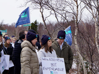 Public health pharmacists protest outside the Health Sciences Centre on Wednsday. They say that better wages are causing hospital pharmacists to depart for the private sector.